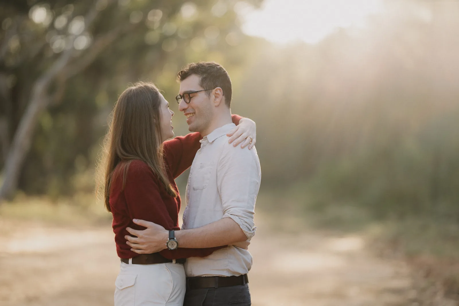 Phoebe and Massimo together in warm golden light